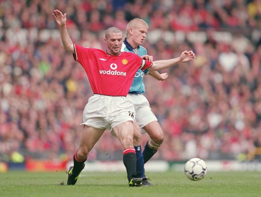 21 Apr 2001: Roy Keane (left) of Manchester United tussles with Alf Inge Haaland (right) of Manchester City during the FA Carling Premiership match played at Old Trafford, in Manchester, England. The match ended in a 1-1 draw. Mandatory Credit: Gary MPrior/Allsport 21 Apr 2001: Roy Keane (left) of Manchester United tussles with Alf Inge Haaland (right) of Manchester City during the FA Carling Premiership match played at Old Trafford, in Manchester, England. The match ended in a 1-1 draw. Mandatory Credit: Gary MPrior/Allsport