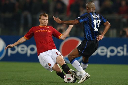 ROME, ITALY - APRIL 19: John Arne Riise (L) of AS Roma competes for the ball with Douglas Maicon of FC Internazionale Milano during the TIM Cup semi-final match between AS Roma and FC Internazionale Milano at Stadio Olimpico on April 19, 2011 in Rome, Italy. (Photo by Paolo Bruno/Getty Images) ROME, ITALY - APRIL 19: John Arne Riise (L) of AS Roma competes for the ball with Douglas Maicon of FC Internazionale Milano during the TIM Cup semi-final match between AS Roma and FC Internazionale Milano at Stadio Olimpico on April 19, 2011 in Rome, Italy. (Photo by Paolo Bruno/Getty Images)