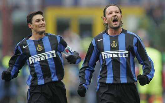 MILAN, ITALY - DECEMBER 19: Inter Milan's Sinisa Mihajlovic celebrates his goal with Cristiano Zanetti, during the Italian Serie A match between Inter Milan and Brescia at the Stadio Giuseppe Meazza on December 19, 2004, in Milan, Italy. (Photo by New Press/Getty Images) *** Local Caption *** Sinisa Mihajlovic;Cristiano Zanetti