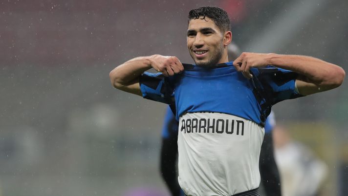 MILAN, ITALY - DECEMBER 05: Achraf Hakimi of FC Internazionale celebrates his first goal during the Serie A match between FC Internazionale and Bologna FC at Stadio Giuseppe Meazza on December 05, 2020 in Milan, Italy. (Photo by Emilio Andreoli - Inter/Inter via Getty Images) 