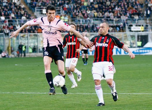 PALERMO, ITALY - FEBRUARY 28: Andrea Caracciolo of Palermo (L) in action against Christian Brocchi of AC Milan during the match between Palermo and AC Milan at the La Favorita Stadium on February 28, 2007 in Palermo, Italy. (Photo by NewPress/Getty Images) PALERMO, ITALY - FEBRUARY 28: Andrea Caracciolo of Palermo (L) in action against Christian Brocchi of AC Milan during the match between Palermo and AC Milan at the La Favorita Stadium on February 28, 2007 in Palermo, Italy. (Photo by NewPress/Getty Images)