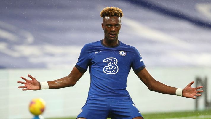 LONDON, ENGLAND - DECEMBER 21: Tammy Abraham of Chelsea celebrates after scoring their team's second goal during the Premier League match between Chelsea and West Ham United at Stamford Bridge on December 21, 2020 in London, England. The match will be played without fans, behind closed doors as a Covid-19 precaution. (Photo by Clive Rose/Getty Images) LONDON, ENGLAND - DECEMBER 21: Tammy Abraham of Chelsea celebrates after scoring their team's second goal during the Premier League match between Chelsea and West Ham United at Stamford Bridge on December 21, 2020 in London, England. The match will be played without fans, behind closed doors as a Covid-19 precaution. (Photo by Clive Rose/Getty Images)