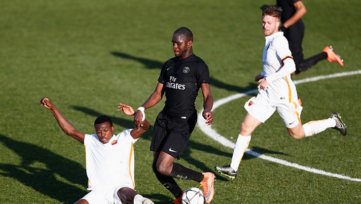 POISSY, FRANCE - MARCH 09: Nura Abdullahi of Roma tackles Odsonne Edouard of PSG during the UEFA Youth League Quarter-final match between Paris Saint Germain and AS Roma at Stade Georges-Lefevre on March 9, 2016 in Poissy, France. (Photo by Dean Mouhtaropoulos/Getty Images) POISSY, FRANCE - MARCH 09: Nura Abdullahi of Roma tackles Odsonne Edouard of PSG during the UEFA Youth League Quarter-final match between Paris Saint Germain and AS Roma at Stade Georges-Lefevre on March 9, 2016 in Poissy, France. (Photo by Dean Mouhtaropoulos/Getty Images)