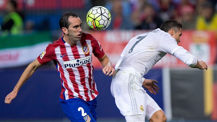 MADRID, SPAIN - OCTOBER 04: Diego Godin (L) of Atletico de Madrid wins the header before Cristiano Ronaldo (R) of Real Madrid CF during the La Liga match between Club Atletico de Madrid and Real Madrid CF at Vicente Calderon Stadium on October 4, 2015 in Madrid, Spain. (Photo by Gonzalo Arroyo Moreno/Getty Images) MADRID, SPAIN - OCTOBER 04: Diego Godin (L) of Atletico de Madrid wins the header before Cristiano Ronaldo (R) of Real Madrid CF during the La Liga match between Club Atletico de Madrid and Real Madrid CF at Vicente Calderon Stadium on October 4, 2015 in Madrid, Spain. (Photo by Gonzalo Arroyo Moreno/Getty Images)