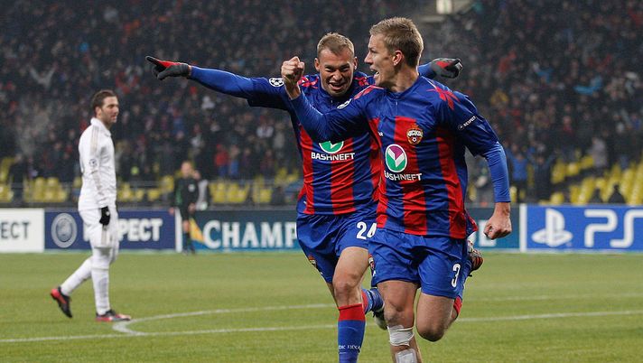 MOSCOW, RUSSIA - FEBRUARY 21: Pontus Wernbloom (R) of CSKA Moscow celebrates with team-mate Vasili Berezutsky after scoring an equaliser in stoppage time during the UEFA Champions League round of 16, first leg match between CSKA Moscow and Real Madrid at the Luzhniki Stadium on February 21, 2012 in Moscow, Russia. (Photo by Harry Engels/Getty Images) MOSCOW, RUSSIA - FEBRUARY 21: Pontus Wernbloom (R) of CSKA Moscow celebrates with team-mate Vasili Berezutsky after scoring an equaliser in stoppage time during the UEFA Champions League round of 16, first leg match between CSKA Moscow and Real Madrid at the Luzhniki Stadium on February 21, 2012 in Moscow, Russia. (Photo by Harry Engels/Getty Images)