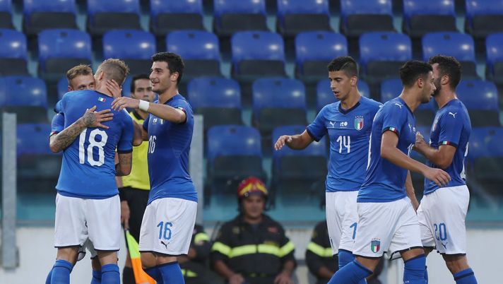 CAGLIARI, ITALY - SEPTEMBER 11:  Federico Di Marco with his teammates of Italy U21 celebrates after scoring the opening goal during the International Friendly match between Italy U21 and Albania U21 at Sardegna Arena on September 11, 2018 in Cagliari, Italy.  (Photo by Paolo Bruno/Getty Images)  CAGLIARI, ITALY - SEPTEMBER 11:  Federico Di Marco with his teammates of Italy U21 celebrates after scoring the opening goal during the International Friendly match between Italy U21 and Albania U21 at Sardegna Arena on September 11, 2018 in Cagliari, Italy.  (Photo by Paolo Bruno/Getty Images)