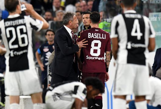 TURIN, ITALY - SEPTEMBER 23: Sinisa Mihajlovic head cach of Torino FC and Daniele Baselli of Torino FC during the Serie A match between Juventus and Torino FC on September 23, 2017 in Turin, Italy. (Photo by Alessandro Sabattini/Getty Images ) TURIN, ITALY - SEPTEMBER 23: Sinisa Mihajlovic head cach of Torino FC and Daniele Baselli of Torino FC during the Serie A match between Juventus and Torino FC on September 23, 2017 in Turin, Italy. (Photo by Alessandro Sabattini/Getty Images )