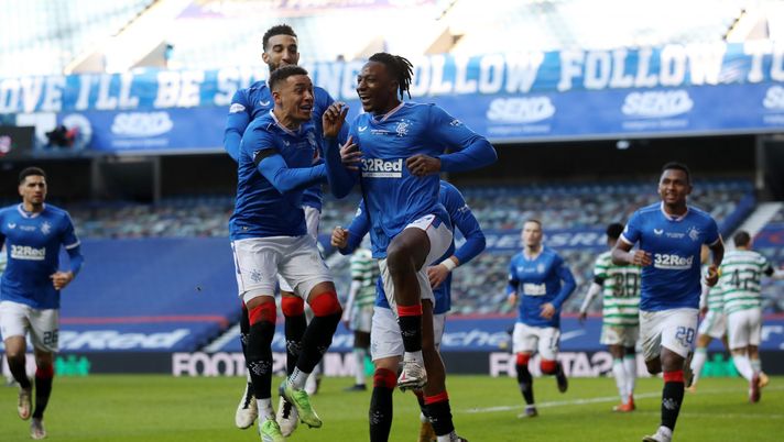 GLASGOW, SCOTLAND - JANUARY 02: Joe Aribo of Rangers celebrates with teammate James Tavernier after scoring their team's first goal during the Ladbrokes Scottish Premiership match between Rangers and Celtic at Ibrox Stadium on January 02, 2021 in Glasgow, Scotland. The match will be played without fans, behind closed doors as a Covid-19 precaution. (Photo by Ian MacNicol/Getty Images) GLASGOW, SCOTLAND - JANUARY 02: Joe Aribo of Rangers celebrates with teammate James Tavernier after scoring their team's first goal during the Ladbrokes Scottish Premiership match between Rangers and Celtic at Ibrox Stadium on January 02, 2021 in Glasgow, Scotland. The match will be played without fans, behind closed doors as a Covid-19 precaution. (Photo by Ian MacNicol/Getty Images)