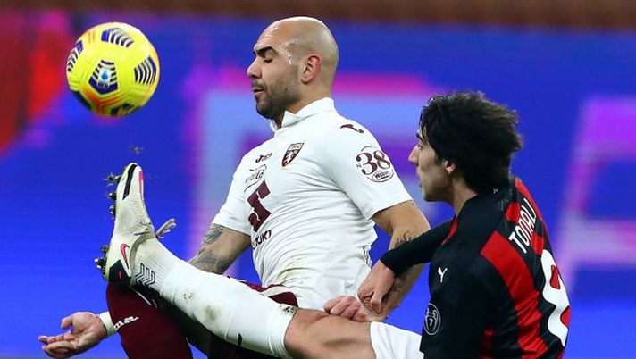 MILAN, ITALY - JANUARY 12: Simone Zaza of Torino is challenged by Sandro Tonali of Milan during the Coppa Italia match between AC Milan and Torino FC at Stadio Giuseppe Meazza on January 12, 2021 in Milan, Italy. Sporting stadiums around Italy remain under strict restrictions due to the Coronavirus Pandemic as Government social distancing laws prohibit fans inside venues resulting in games being played behind closed doors. (Photo by Marco Luzzani/Getty Images) MILAN, ITALY - JANUARY 12: Simone Zaza of Torino is challenged by Sandro Tonali of Milan during the Coppa Italia match between AC Milan and Torino FC at Stadio Giuseppe Meazza on January 12, 2021 in Milan, Italy. Sporting stadiums around Italy remain under strict restrictions due to the Coronavirus Pandemic as Government social distancing laws prohibit fans inside venues resulting in games being played behind closed doors. (Photo by Marco Luzzani/Getty Images)