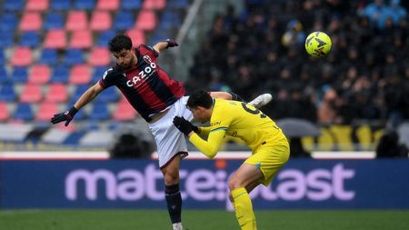 BOLOGNA, ITALY - FEBRUARY 26: Riccardo Orsolini of Bologna FC competes for the ball with Alessandro Bastoni of FC Internazionale during the Serie A match between Bologna FC and FC Internazionale at Stadio Renato Dall'Ara on February 26, 2023 in Bologna, Italy. (Photo by Alessandro Sabattini/Getty Images)
