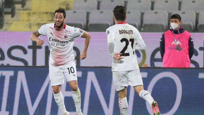 FLORENCE, ITALY - MARCH 21: Hakan Calhanoglu of AC Milan celebrates after scoring a goal during the Serie A match between ACF Fiorentina and AC Milan at Stadio Artemio Franchi on March 21, 2021 in Florence, Italy.  (Photo by Gabriele Maltinti/Getty Images) 