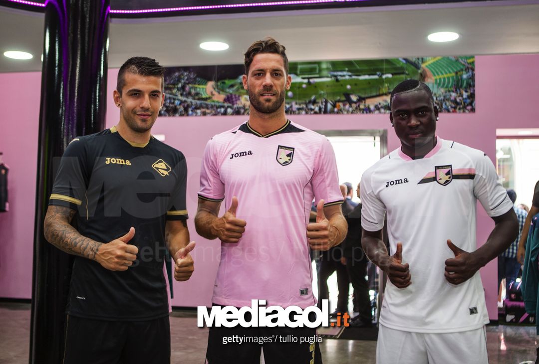  (L-R) Aleksandar Trajkovski, Andrea Rispoli and Carlos Embalo pose with US Citta di Palermo new kit  at US Citta di Palermo Store on July 7, 2016 in Palermo, Italy.  