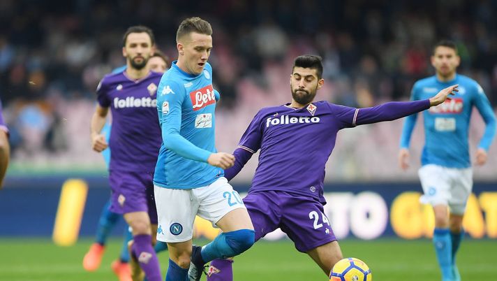 Piotr Zielinski vies with ACF Fiorentina player Marco Benassi Piotr Zielinski vies with ACF Fiorentina player Marco Benassi