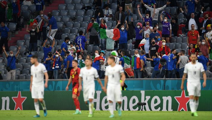 MUNICH, GERMANY - JULY 02: Italy fans celebrate a goal scored by Leonardo Bonucci (Not pictured) that was later disallowed for offside during the UEFA Euro 2020 Championship Quarter-final match between Belgium and Italy at Football Arena Munich on July 02, 2021 in Munich, Germany. (Photo by Andreas Geber - Pool/Getty Images) MUNICH, GERMANY - JULY 02: Italy fans celebrate a goal scored by Leonardo Bonucci (Not pictured) that was later disallowed for offside during the UEFA Euro 2020 Championship Quarter-final match between Belgium and Italy at Football Arena Munich on July 02, 2021 in Munich, Germany. (Photo by Andreas Geber - Pool/Getty Images)