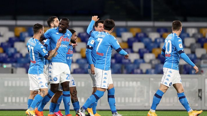 NAPLES, ITALY - JANUARY 28: Matteo Politano of S.S.C. Napoli , and Lorenzo Insigne of S.S.C. Napoli celebrate with Kalidou Koulibaly of S.S.C. Napoli after he scores his sides 1st goal during the Coppa Italia match between SSC Napoli and Spezia Calcio at Stadio Diego Armando Maradona on January 28, 2021 in Naples, Italy. Sporting stadiums around Italy remain under strict restrictions due to the Coronavirus Pandemic as Government social distancing laws prohibit fans inside venues resulting in games being played behind closed doors. (Photo by Francesco Pecoraro/Getty Images) NAPLES, ITALY - JANUARY 28: Matteo Politano of S.S.C. Napoli , and Lorenzo Insigne of S.S.C. Napoli celebrate with Kalidou Koulibaly of S.S.C. Napoli after he scores his sides 1st goal during the Coppa Italia match between SSC Napoli and Spezia Calcio at Stadio Diego Armando Maradona on January 28, 2021 in Naples, Italy. Sporting stadiums around Italy remain under strict restrictions due to the Coronavirus Pandemic as Government social distancing laws prohibit fans inside venues resulting in games being played behind closed doors. (Photo by Francesco Pecoraro/Getty Images)