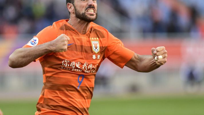 Graziano Pelle of Shandong Luneng celebrates after scored during the AFC Champions League group stage football match between China's Shandong Luneng and Japan's Kashima Antlers in Jinan in China's eastern Shandong province on March 12, 2019. (Photo by STR / AFP) / China OUT (Photo credit should read STR/AFP via Getty Images) Parma, c’è la firma di Pellè: ora si aspetta solo l’ufficialità e l’inserimento nel listone - immagine 1