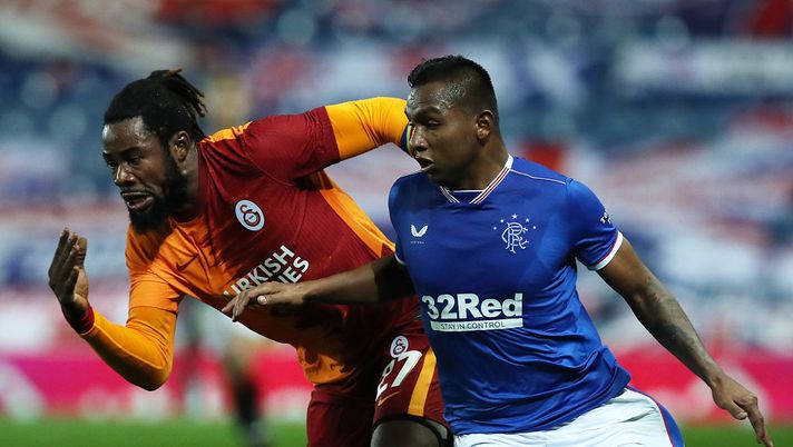GLASGOW, SCOTLAND - OCTOBER 01: Alfredo Morelos of Rangers battles for possession with Christian Luyindama of Galatasaray during the UEFA Europa League play-off match between Rangers and Galatasaray at Ibrox Stadium on October 01, 2020 in Glasgow, Scotland. Football Stadiums around Europe remain empty due to the Coronavirus Pandemic as Government social distancing laws prohibit fans inside venues resulting in fixtures being played behind closed doors. (Photo by Ian MacNicol/Getty Images) GLASGOW, SCOTLAND - OCTOBER 01: Alfredo Morelos of Rangers battles for possession with Christian Luyindama of Galatasaray during the UEFA Europa League play-off match between Rangers and Galatasaray at Ibrox Stadium on October 01, 2020 in Glasgow, Scotland. Football Stadiums around Europe remain empty due to the Coronavirus Pandemic as Government social distancing laws prohibit fans inside venues resulting in fixtures being played behind closed doors. (Photo by Ian MacNicol/Getty Images)