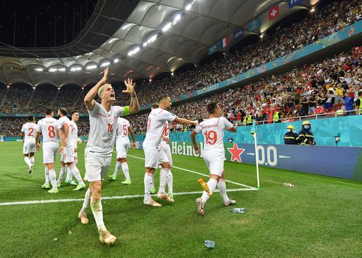 BUCHAREST, ROMANIA - JUNE 28: Granit Xhaka of Switzerland celebrates their side's third goal scored by team mate Mario Gavranovic during the UEFA Euro 2020 Championship Round of 16 match between France and Switzerland at National Arena on June 28, 2021 in Bucharest, Romania. (Photo by Justin Setterfield/Getty Images) BUCHAREST, ROMANIA - JUNE 28: Granit Xhaka of Switzerland celebrates their side's third goal scored by team mate Mario Gavranovic during the UEFA Euro 2020 Championship Round of 16 match between France and Switzerland at National Arena on June 28, 2021 in Bucharest, Romania. (Photo by Justin Setterfield/Getty Images)