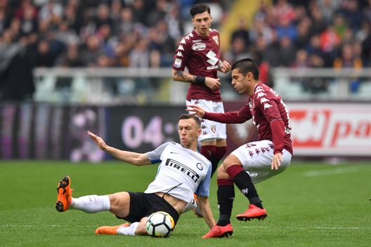 TURIN, ITALY - APRIL 08: Iago Falque (R) of Torino FC is tackled by Ivan Perisic of FC Internazionale during the Serie A match between Torino FC and FC Internazionale at Stadio Olimpico di Torino on April 8, 2018 in Turin, Italy. (Photo by Valerio Pennicino/Getty Images) TURIN, ITALY - APRIL 08: Iago Falque (R) of Torino FC is tackled by Ivan Perisic of FC Internazionale during the Serie A match between Torino FC and FC Internazionale at Stadio Olimpico di Torino on April 8, 2018 in Turin, Italy. (Photo by Valerio Pennicino/Getty Images)