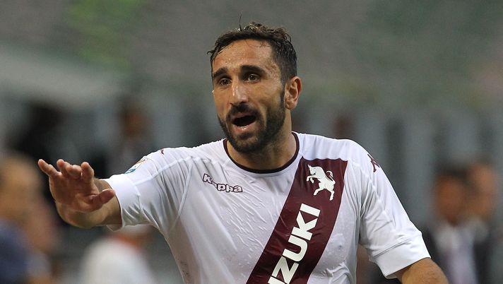 MILAN, ITALY - AUGUST 21:  Cristian Molinaro of Torino FC gestures during the Serie A match between AC Milan and FC Torino at Stadio Giuseppe Meazza on August 21, 2016 in Milan, Italy.  (Photo by Marco Luzzani/Getty Images)