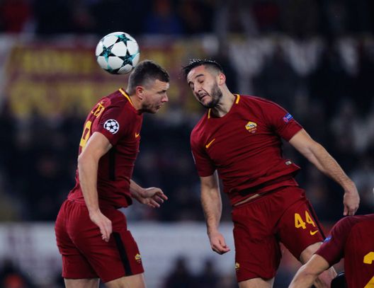 ROME, ITALY - DECEMBER 05: Kostas Manolas and Edin Dzeko of AS Roma in action during the UEFA Champions League group C match between AS Roma and Qarabag FK at Stadio Olimpico on December 5, 2017 in Rome, Italy. (Photo by Paolo Bruno/Getty Images)