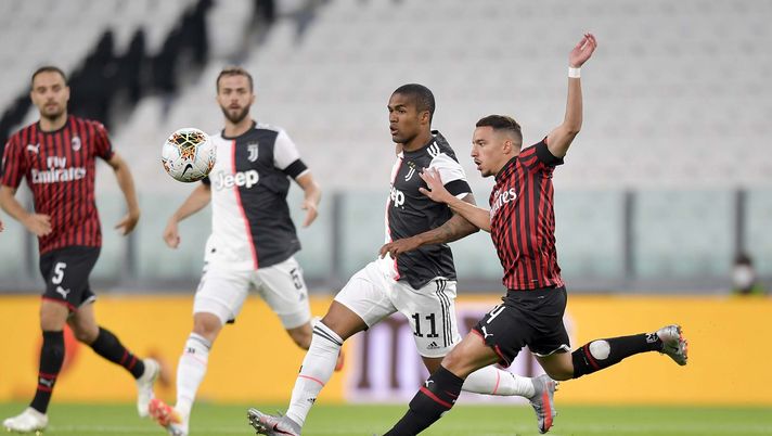 Douglas Costa e Ismaël Bennacer in Juventus-Milan di Coppa Italia (credits: GETTY Images) Douglas Costa e Ismaël Bennacer in Juventus-Milan di Coppa Italia (credits: GETTY Images)