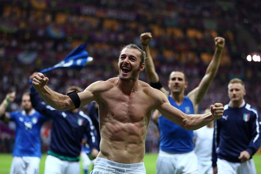 WARSAW, POLAND - JUNE 28:  Federico Balzaretti of Italy celebrates victory with his team-mates after the UEFA EURO 2012 semi final match between Germany and Italy at the National Stadium on June 28, 2012 in Warsaw, Poland.  (Photo by Michael Steele/Getty Images) 