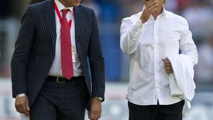 BASEL, SWITZERLAND - MAY 29:  Manager Christian Constantin (L) and coach Laurent Roussey talk during the Swiss Cup final match between Neuchatel Xamax FC and FC Sion at the Sankt Jakob Stadium on May 29, 2011 in Basel, Switzerland.  (Photo by Sebastien Bozon/EuroFootball/Getty Images) 