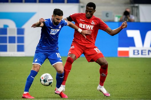 SINSHEIM, GERMANY - MAY 27: Munas Dabbur (L) of Hoffenheim in action against Kingsley Ehizibue (R) of Cologne during the Bundesliga match between TSG 1899 Hoffenheim and 1. FC Koeln at PreZero-Arena on May 27, 2020 in Sinsheim, Germany. (Photo by Ronald Wittek/Pool via Getty Images) SINSHEIM, GERMANY - MAY 27: Munas Dabbur (L) of Hoffenheim in action against Kingsley Ehizibue (R) of Cologne during the Bundesliga match between TSG 1899 Hoffenheim and 1. FC Koeln at PreZero-Arena on May 27, 2020 in Sinsheim, Germany. (Photo by Ronald Wittek/Pool via Getty Images)