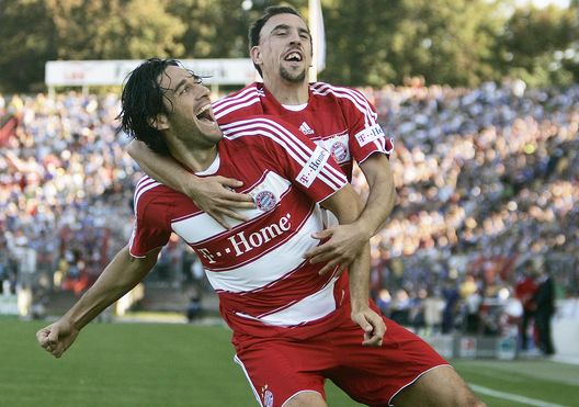KARLSRUHE, GERMANY - SEPTEMBER 23: Luca Toni (L) and Franck Ribery (R) of Munich celebrate the 1:0 goal by Toni during the Bundesliga match between Karlsruher SC and Bayern Munich at the Wildpark Stadium on September 23, 2007 in Karlsruhe, Germany. (Photo by Alexander Heimann/Bongarts/Getty Images) KARLSRUHE, GERMANY - SEPTEMBER 23: Luca Toni (L) and Franck Ribery (R) of Munich celebrate the 1:0 goal by Toni during the Bundesliga match between Karlsruher SC and Bayern Munich at the Wildpark Stadium on September 23, 2007 in Karlsruhe, Germany. (Photo by Alexander Heimann/Bongarts/Getty Images)