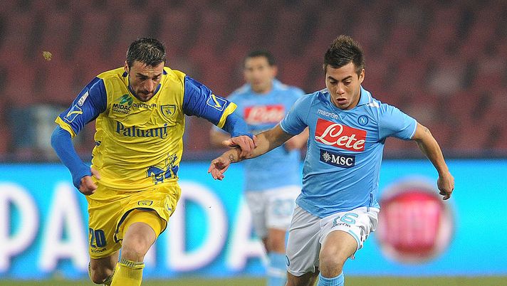 NAPLES, ITALY - FEBRUARY 13: Gennaro Sardo of Chievo Verona and Edu Vargas of Napoli in action during the Serie A match between SSC Napoli and AC Chievo Verona at Stadio San Paolo on February 13, 2012 in Naples, Italy. (Photo by Giuseppe Bellini/Getty Images) NAPLES, ITALY - FEBRUARY 13: Gennaro Sardo of Chievo Verona and Edu Vargas of Napoli in action during the Serie A match between SSC Napoli and AC Chievo Verona at Stadio San Paolo on February 13, 2012 in Naples, Italy. (Photo by Giuseppe Bellini/Getty Images)