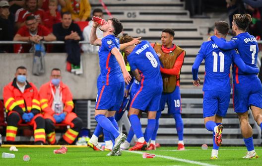 BUDAPEST, HUNGARY - SEPTEMBER 02: Declan Rice of England drinks from a cup that was thrown at Raheem Sterling after scoring their first goal during the 2022 FIFA World Cup Qualifier match between Hungary and England at Stadium Puskas Ferenc on September 02, 2021 in Budapest, Hungary. (Photo by Michael Regan/Getty Images) BUDAPEST, HUNGARY - SEPTEMBER 02: Declan Rice of England drinks from a cup that was thrown at Raheem Sterling after scoring their first goal during the 2022 FIFA World Cup Qualifier match between Hungary and England at Stadium Puskas Ferenc on September 02, 2021 in Budapest, Hungary. (Photo by Michael Regan/Getty Images)