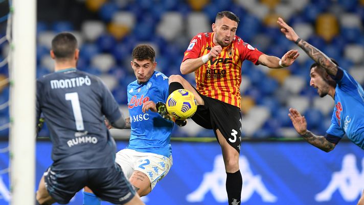 NAPLES, ITALY - FEBRUARY 28: Giovanni Di Lorenzo of Napoli scores their side's second goal past Lorenzo Montipo of Benevento Calcio whilst under pressure from Gaetano Letizia of Benevento Calcio during the Serie A match between SSC Napoli and Benevento Calcio at Stadio Diego Armando Maradona on February 28, 2021 in Naples, Italy. Sporting stadiums around Italy remain under strict restrictions due to the Coronavirus Pandemic as Government social distancing laws prohibit fans inside venues resulting in games being played behind closed doors. (Photo by Francesco Pecoraro/Getty Images) NAPLES, ITALY - FEBRUARY 28: Giovanni Di Lorenzo of Napoli scores their side's second goal past Lorenzo Montipo of Benevento Calcio whilst under pressure from Gaetano Letizia of Benevento Calcio during the Serie A match between SSC Napoli and Benevento Calcio at Stadio Diego Armando Maradona on February 28, 2021 in Naples, Italy. Sporting stadiums around Italy remain under strict restrictions due to the Coronavirus Pandemic as Government social distancing laws prohibit fans inside venues resulting in games being played behind closed doors. (Photo by Francesco Pecoraro/Getty Images)