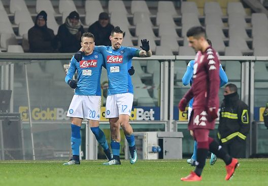 TURIN, ITALY - DECEMBER 16: Marek Hamsik and Piotr Zielinski of SSC Napoli celebrate the 0-2 goal scored by Piotr Zielinski, beside the disappointment of Iago Falquei player of Torino FC during the Serie A match between Torino FC and SSC Napoli at Stadio Olimpico di Torino on December 16, 2017 in Turin, Italy. (Photo by Francesco Pecoraro/Getty Images) TURIN, ITALY - DECEMBER 16: Marek Hamsik and Piotr Zielinski of SSC Napoli celebrate the 0-2 goal scored by Piotr Zielinski, beside the disappointment of Iago Falquei player of Torino FC during the Serie A match between Torino FC and SSC Napoli at Stadio Olimpico di Torino on December 16, 2017 in Turin, Italy. (Photo by Francesco Pecoraro/Getty Images)