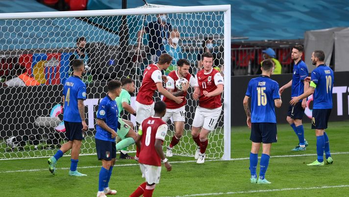 LONDON, ENGLAND - JUNE 26: Christopher Trimmel of Austria collects the ball from the net after their side's first goal scored by Sasa Kalajdzic (Not pictured) during the UEFA Euro 2020 Championship Round of 16 match between Italy and Austria at Wembley Stadium at Wembley Stadium on June 26, 2021 in London, England. (Photo by Laurence Griffiths/Getty Images) LONDON, ENGLAND - JUNE 26: Christopher Trimmel of Austria collects the ball from the net after their side's first goal scored by Sasa Kalajdzic (Not pictured) during the UEFA Euro 2020 Championship Round of 16 match between Italy and Austria at Wembley Stadium at Wembley Stadium on June 26, 2021 in London, England. (Photo by Laurence Griffiths/Getty Images)