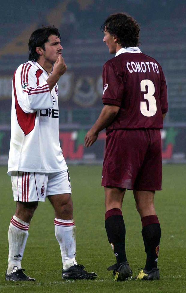 04 Nov 2001: Comotto of Tpriono and Gennaro Gattuso of AC Milan in action during the Serie A match between Torino and AC Milan , played at the Delle Alpi Stadium, Torino . DIGITAL IMAGE Mandatory Credit: Grazia Neri/ALLSPORT 04 Nov 2001: Comotto of Tpriono and Gennaro Gattuso of AC Milan in action during the Serie A match between Torino and AC Milan , played at the Delle Alpi Stadium, Torino . DIGITAL IMAGE Mandatory Credit: Grazia Neri/ALLSPORT