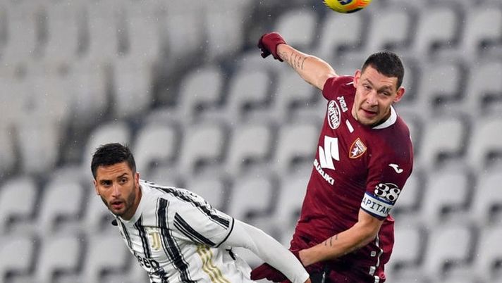 TURIN, ITALY - DECEMBER 05: Rodrigo Bentancur of Juventus competes for a header with Andrea Belotti of Torino FC during the Serie A match between Juventus and Torino FC at Allianz Stadium on December 05, 2020 in Turin, Italy. Football Stadiums around Italy remain empty due to the Coronavirus Pandemic as Government social distancing laws prohibit fans inside venues resulting in fixtures being played behind closed doors. (Photo by Valerio Pennicino/Getty Images) TURIN, ITALY - DECEMBER 05: Rodrigo Bentancur of Juventus competes for a header with Andrea Belotti of Torino FC during the Serie A match between Juventus and Torino FC at Allianz Stadium on December 05, 2020 in Turin, Italy. Football Stadiums around Italy remain empty due to the Coronavirus Pandemic as Government social distancing laws prohibit fans inside venues resulting in fixtures being played behind closed doors. (Photo by Valerio Pennicino/Getty Images)