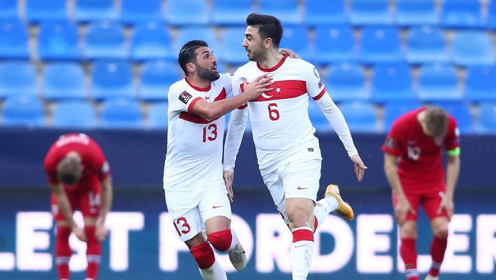 MALAGA, SPAIN - MARCH 27: Ozan Tufan of Turkey celebrates with Umut Merao after scoring their team's third goal during the FIFA World Cup 2022 Qatar qualifying match between Norway and Turkey at the La Rosaleda Stadium on March 27, 2021 in Malaga, Spain. Sporting stadiums around Norway remain under strict restrictions due to the Coronavirus Pandemic as Government social distancing laws prohibit fans inside venues resulting in games being played behind closed doors. (Photo by Fran Santiago/Getty Images) MALAGA, SPAIN - MARCH 27: Ozan Tufan of Turkey celebrates with Umut Merao after scoring their team's third goal during the FIFA World Cup 2022 Qatar qualifying match between Norway and Turkey at the La Rosaleda Stadium on March 27, 2021 in Malaga, Spain. Sporting stadiums around Norway remain under strict restrictions due to the Coronavirus Pandemic as Government social distancing laws prohibit fans inside venues resulting in games being played behind closed doors. (Photo by Fran Santiago/Getty Images)