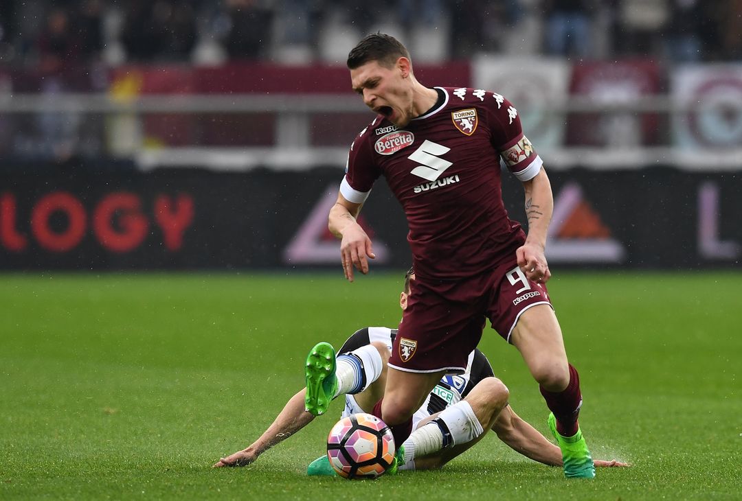  TURIN, ITALY - APRIL 02:  Andrea Belotti (R) of FC Torino is tackled by Sven Kums of Udinese Calcio during the Serie A match between FC Torino and Udinese Calcio at Stadio Olimpico di Torino on April 2, 2017 in Turin, Italy.  (Photo by Valerio Pennicino/Getty Images) 