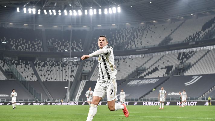 TURIN, ITALY - FEBRUARY 22: Cristiano Ronaldo of Juventus celebrates after scoring his team's second goal during the Serie A match between Juventus and FC Crotone at Allianz Stadium on February 22, 2021 in Turin, Italy. Sporting stadiums around Italy remain under strict restrictions due to the Coronavirus Pandemic as Government social distancing laws prohibit fans inside venues resulting in games being played behind closed doors. (Photo by Daniele Badolato - Juventus FC/Juventus FC via Getty Images) TURIN, ITALY - FEBRUARY 22: Cristiano Ronaldo of Juventus celebrates after scoring his team's second goal during the Serie A match between Juventus and FC Crotone at Allianz Stadium on February 22, 2021 in Turin, Italy. Sporting stadiums around Italy remain under strict restrictions due to the Coronavirus Pandemic as Government social distancing laws prohibit fans inside venues resulting in games being played behind closed doors. (Photo by Daniele Badolato - Juventus FC/Juventus FC via Getty Images)