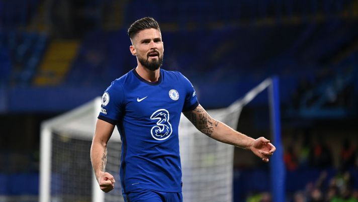 LONDON, ENGLAND - DECEMBER 05: Olivier Giroud of Chelsea celebrates after scoring their team's first goal during the Premier League match between Chelsea and Leeds United at Stamford Bridge on December 05, 2020 in London, England. A limited number of fans are welcomed back to stadiums to watch elite football across England. This was following easing of restrictions on spectators in tiers one and two areas only. (Photo by Daniel Leal-Olivas - Pool/Getty Images) LONDON, ENGLAND - DECEMBER 05: Olivier Giroud of Chelsea celebrates after scoring their team's first goal during the Premier League match between Chelsea and Leeds United at Stamford Bridge on December 05, 2020 in London, England. A limited number of fans are welcomed back to stadiums to watch elite football across England. This was following easing of restrictions on spectators in tiers one and two areas only. (Photo by Daniel Leal-Olivas - Pool/Getty Images)