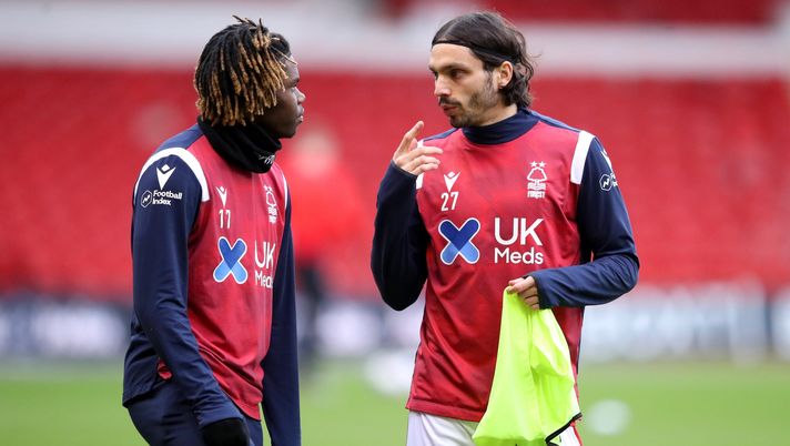 NOTTINGHAM, ENGLAND - JANUARY 30: Alex Mighten and Filip Krovinovic of Nottingham Forest interact during the warm up prior to the Sky Bet Championship match between Nottingham Forest and Barnsley at City Ground on January 30, 2021 in Nottingham, England. Sporting stadiums around the UK remain under strict restrictions due to the Coronavirus Pandemic as Government social distancing laws prohibit fans inside venues resulting in games being played behind closed doors. (Photo by Alex Pantling/Getty Images) NOTTINGHAM, ENGLAND - JANUARY 30: Alex Mighten and Filip Krovinovic of Nottingham Forest interact during the warm up prior to the Sky Bet Championship match between Nottingham Forest and Barnsley at City Ground on January 30, 2021 in Nottingham, England. Sporting stadiums around the UK remain under strict restrictions due to the Coronavirus Pandemic as Government social distancing laws prohibit fans inside venues resulting in games being played behind closed doors. (Photo by Alex Pantling/Getty Images)